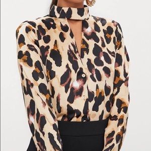 Animal print blouse with choker neck detail